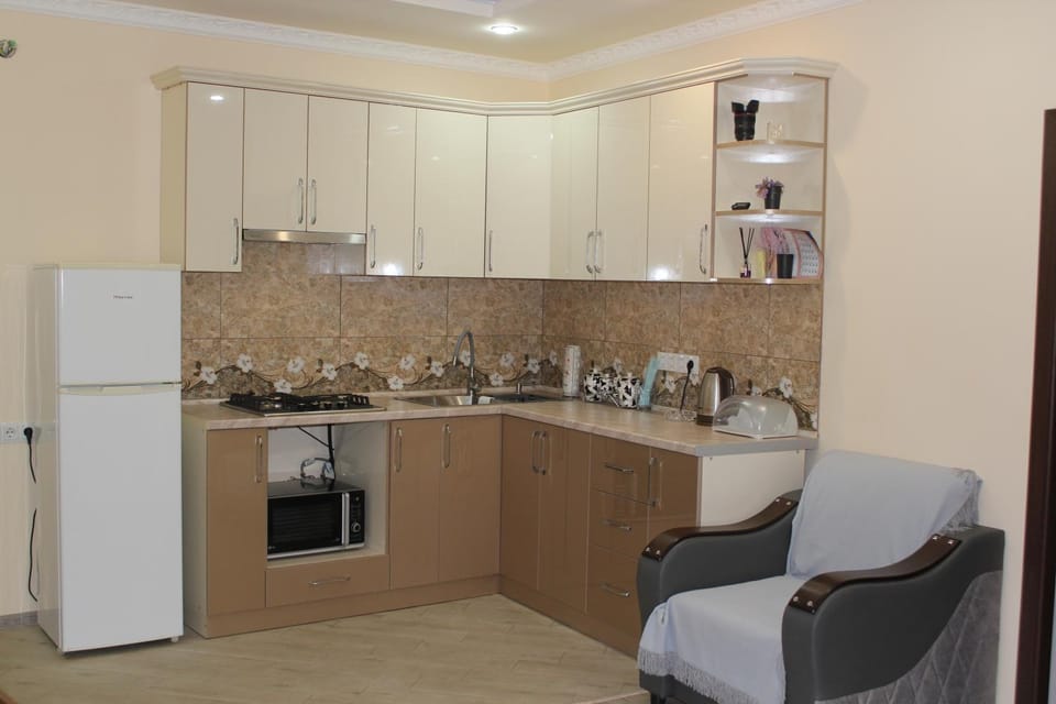 Coffee/tea facilities, Kitchen or kitchenette, stove, kitchen, kitchen