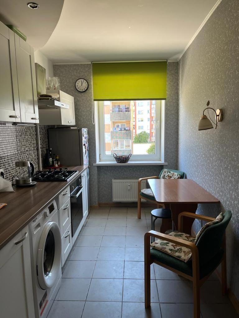 Kitchen or kitchenette, toaster, washing machine