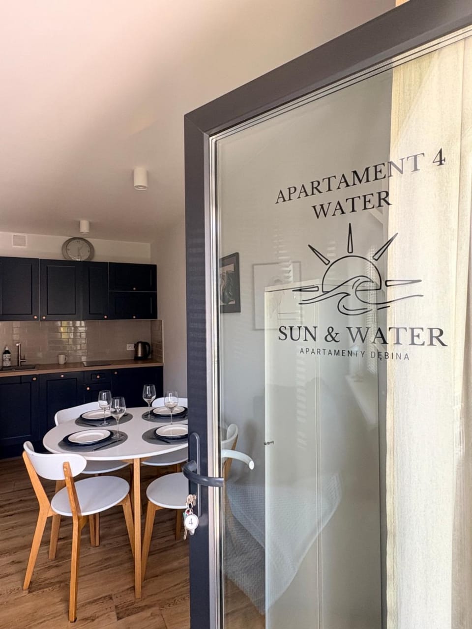 Facade/entrance, kitchen