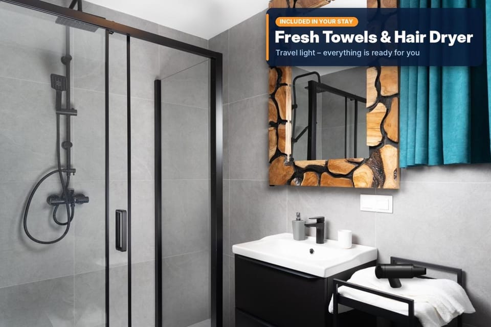 Shower, Toilet, Bathroom, hair dryier, towels, towels