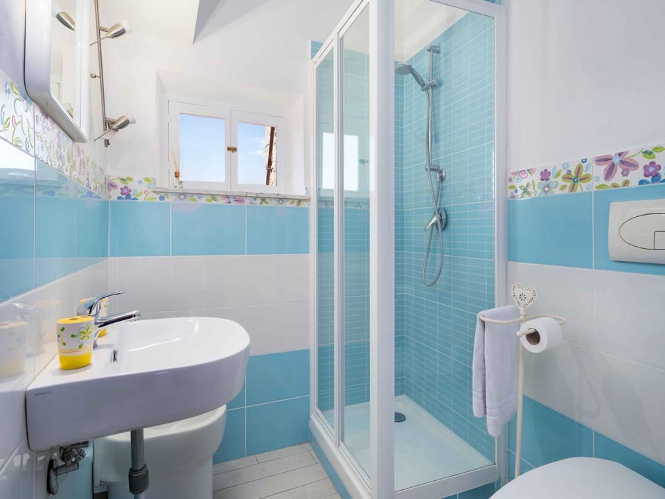 Shower, Bathroom, bidet, hair dryier, towels