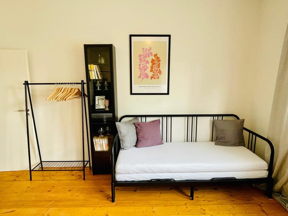 Bed, Seating area, wardrobe