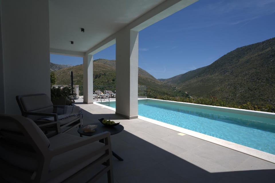 Patio, Day, Natural landscape, Mountain view, Pool view, Swimming pool, sunbed