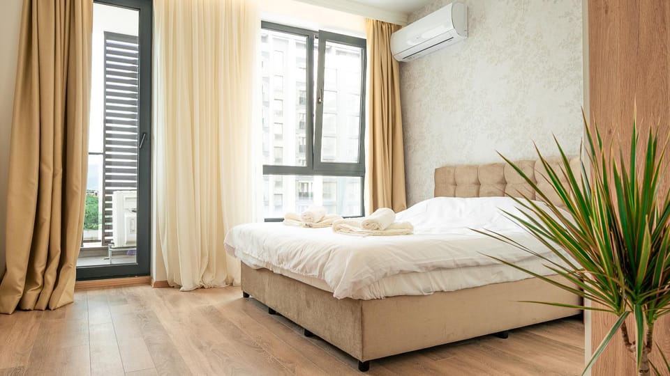 Bed, Photo of the whole room, Bedroom, Family, towels, air conditioner