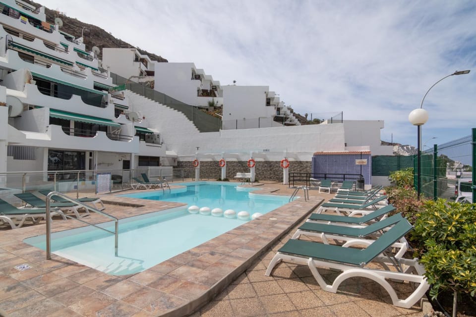 Property building, Living room, Swimming pool