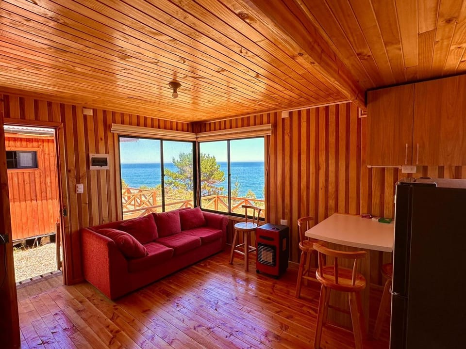 Natural landscape, Living room, Seating area, Dining area, Sea view