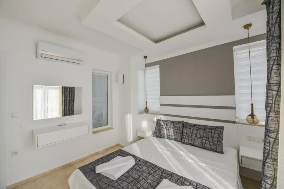 Bed, Bedroom, towels, wardrobe, air conditioner