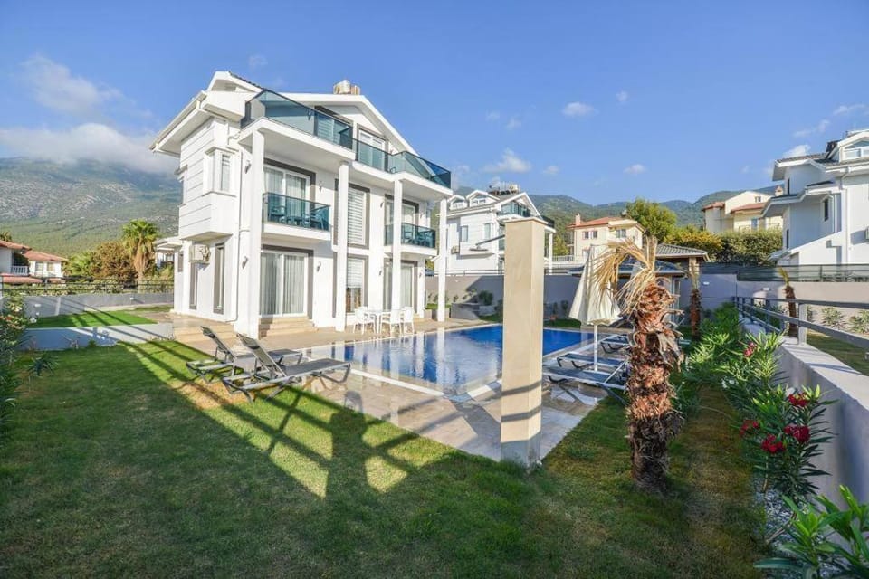 Property building, Spring, Day, Natural landscape, Garden, Garden view, Pool view, Swimming pool