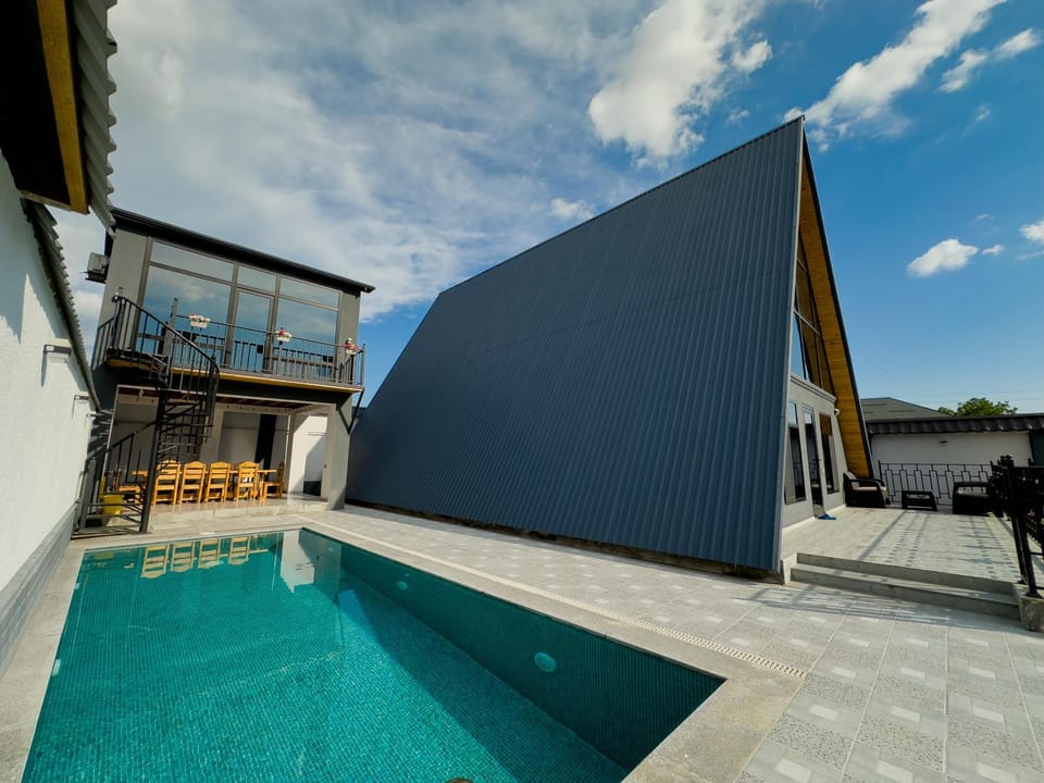 Property building, Pool view, Swimming pool, sunbed