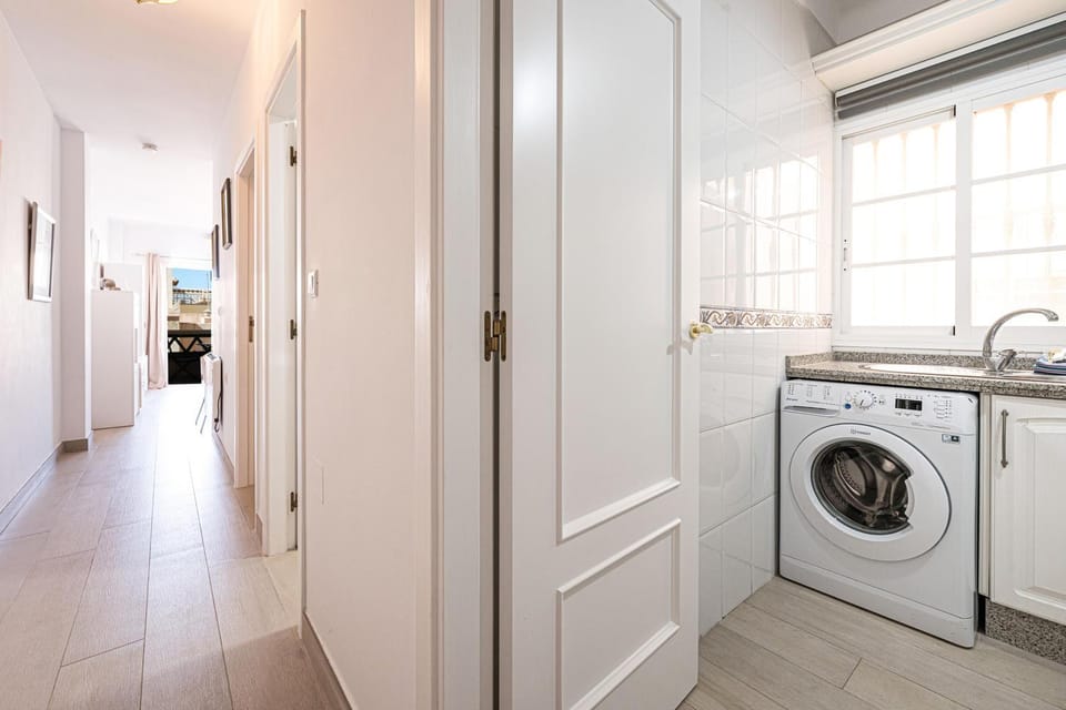 Kitchen or kitchenette, washing machine