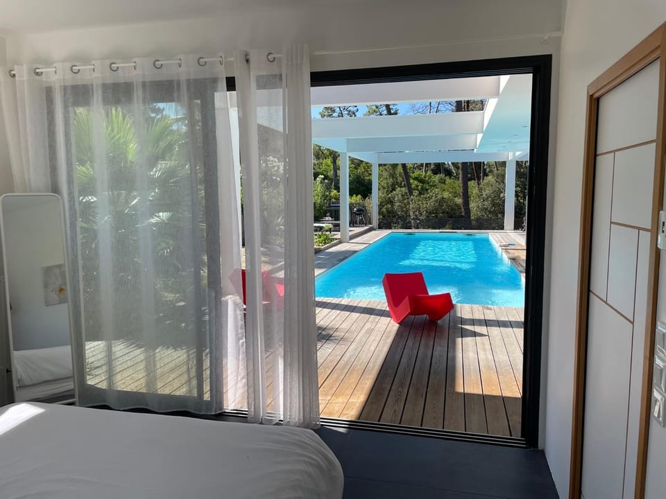 Villa CALIFORNIA Piscine chauffée 14x4m Moulleau Abatilles 10 pers Villa in Arcachon