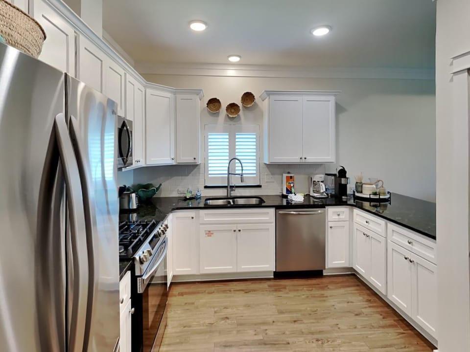 Kitchen or kitchenette, dishwasher, microwave, oven, stove, kitchen