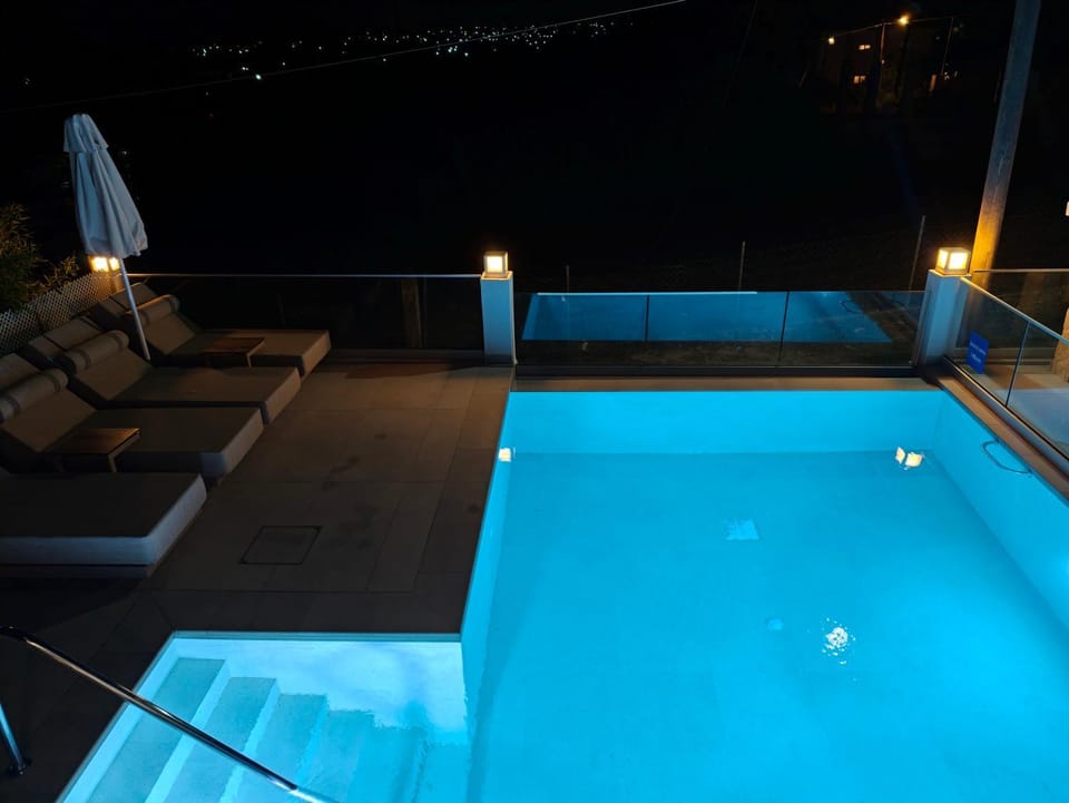 Night, Pool view, Swimming pool, sunbed