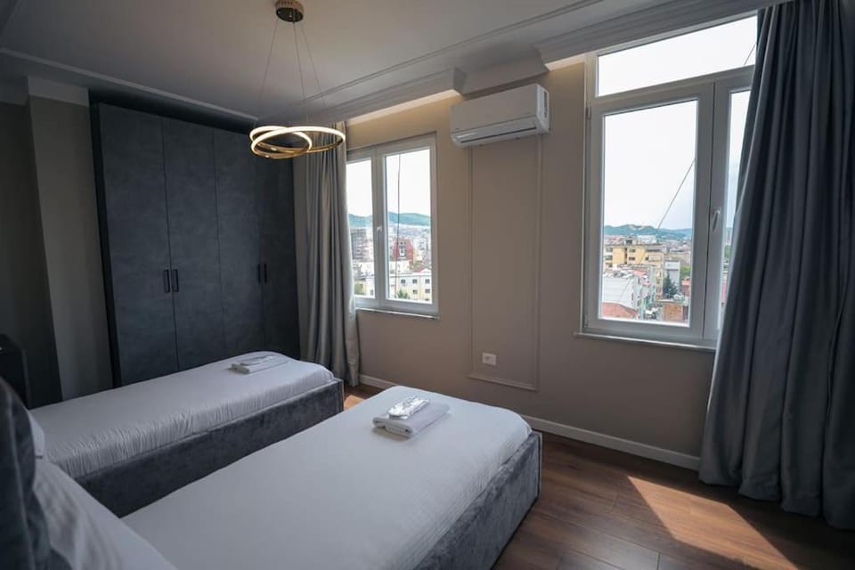 Bed, Photo of the whole room, Bedroom, towels, air conditioner