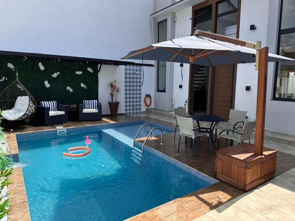 Property building, Patio, Pool view, Swimming pool, Swimming pool