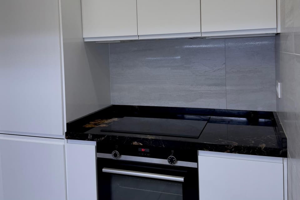 Kitchen or kitchenette, oven, stove