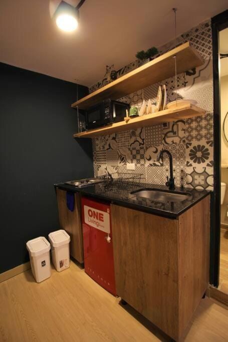 Alojamiento en Laureles Medellín con cocina y baño privado - ONE106 By Roots Rentals Apartment in Medellin
