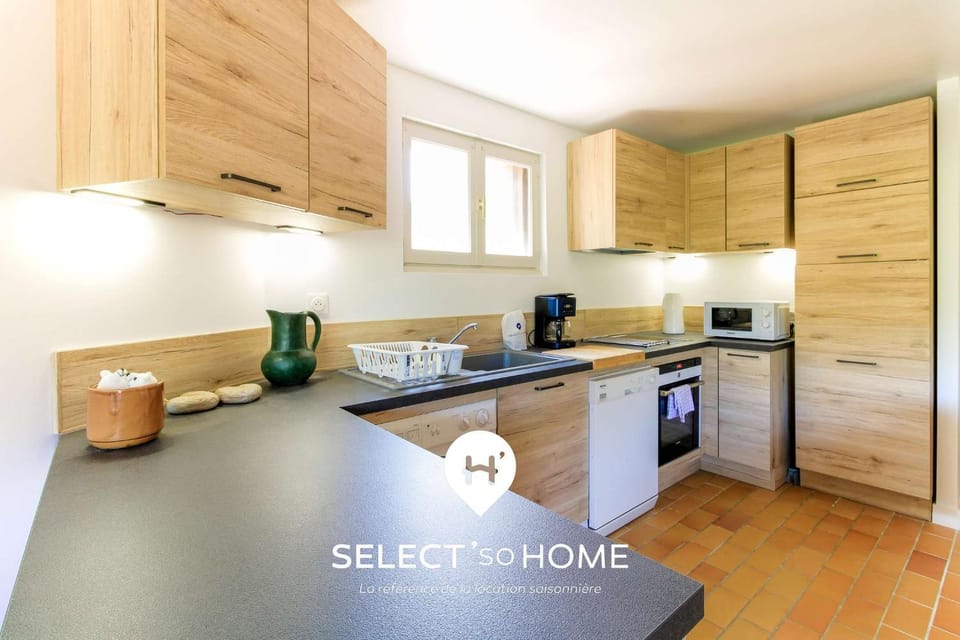 Kitchen or kitchenette, dishwasher, oven, stove, toaster