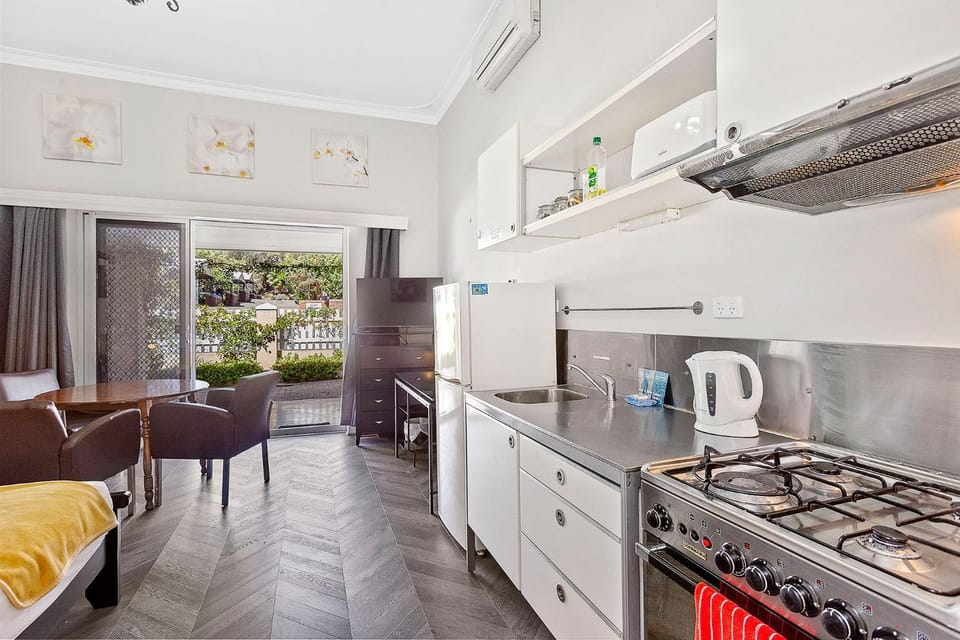 Kitchen or kitchenette, microwave, oven