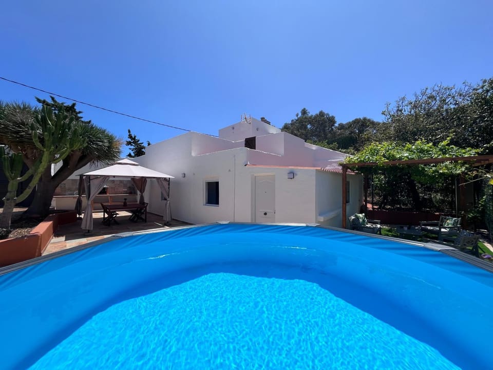 Property building, Living room, Swimming pool