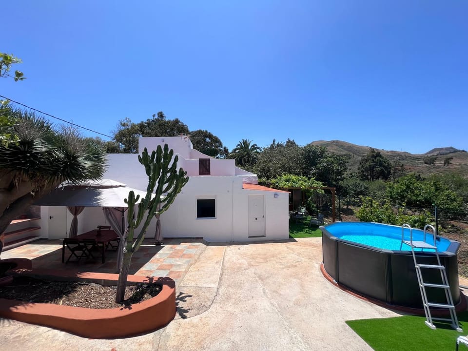 Property building, Living room, Swimming pool
