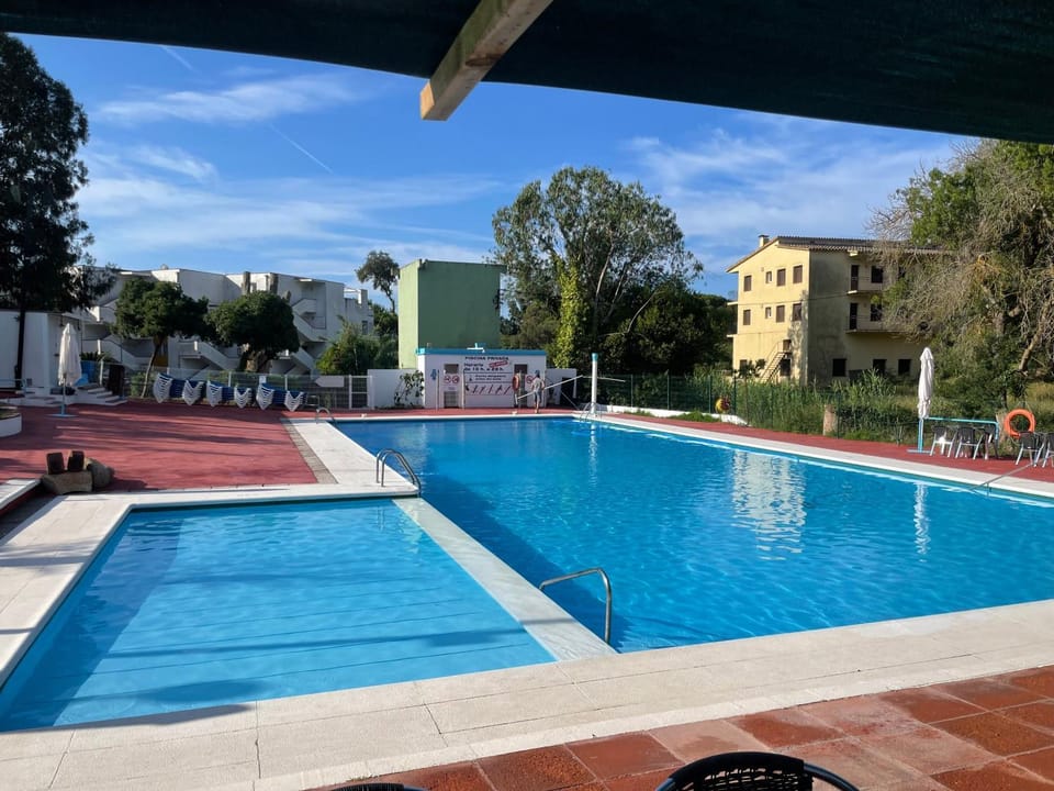 Property building, Living room, Swimming pool