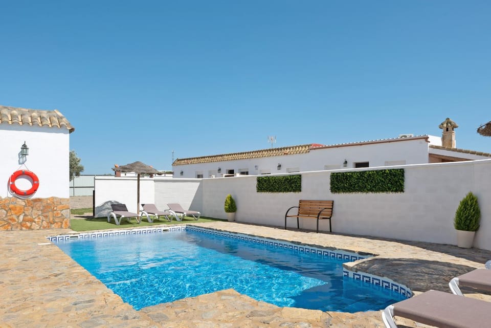 Property building, Living room, Swimming pool