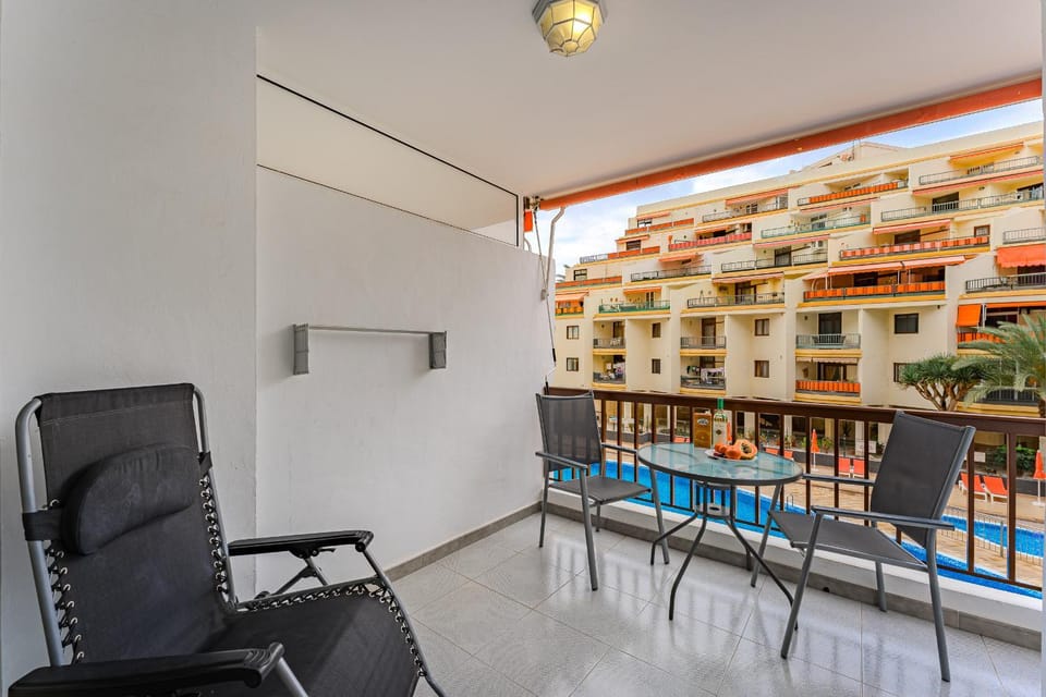 View (from property/room), Balcony/Terrace, Seating area, Pool view, sunbed