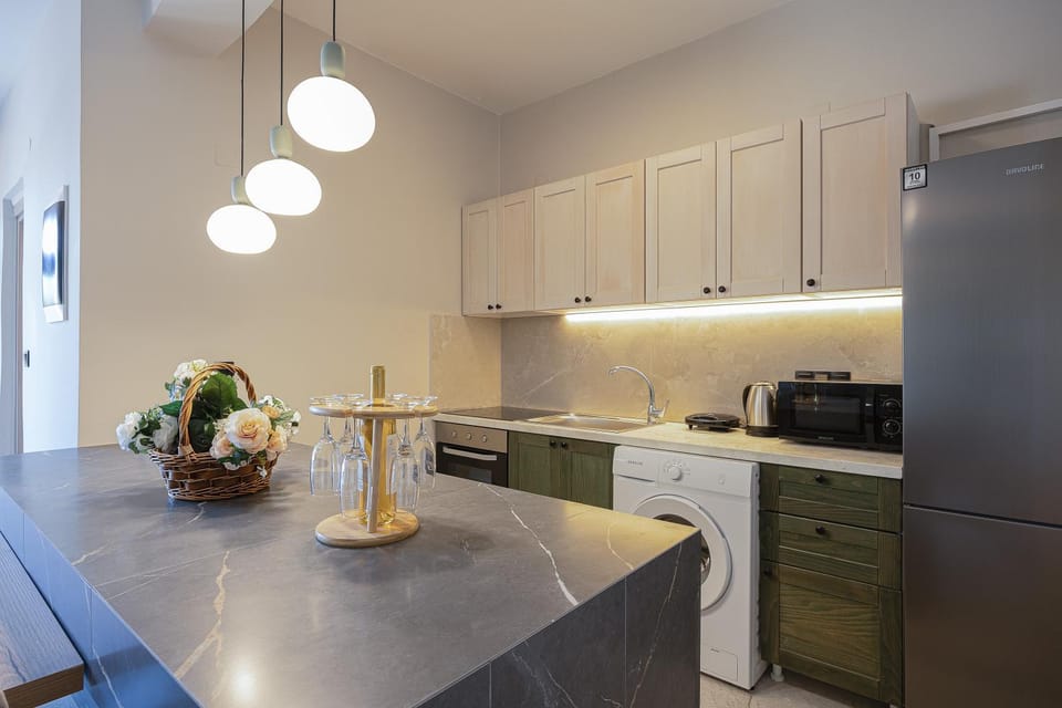 Kitchen or kitchenette, oven
