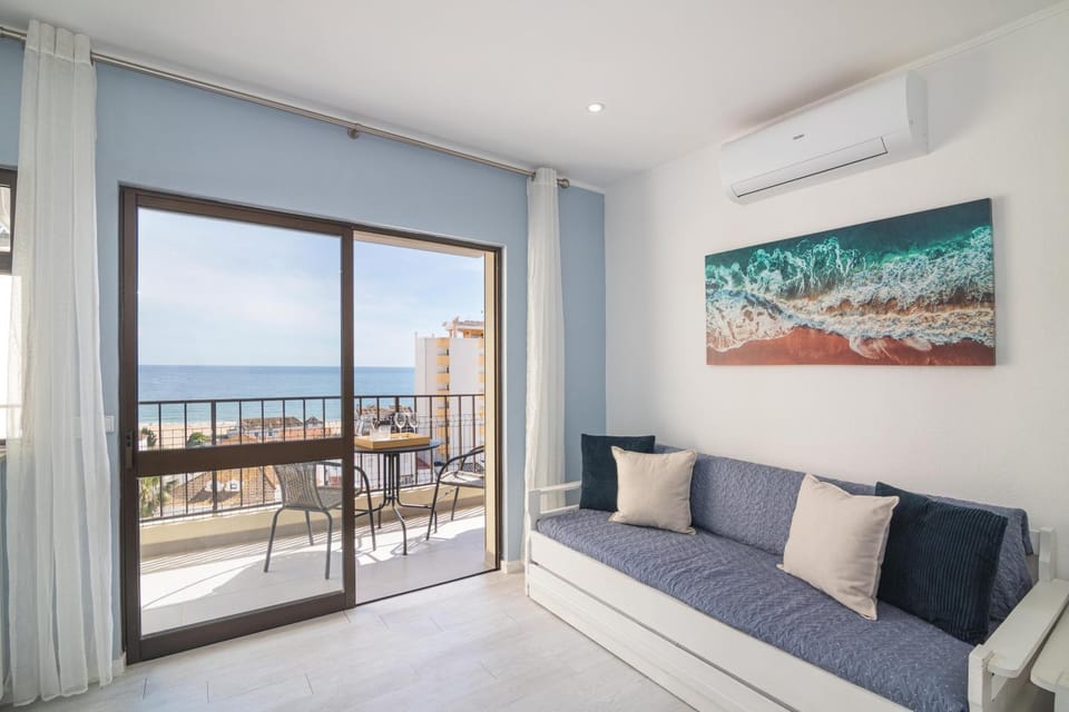 Patio, Bed, Balcony/Terrace, Living room, Photo of the whole room, Seating area, Dining area, Sea view