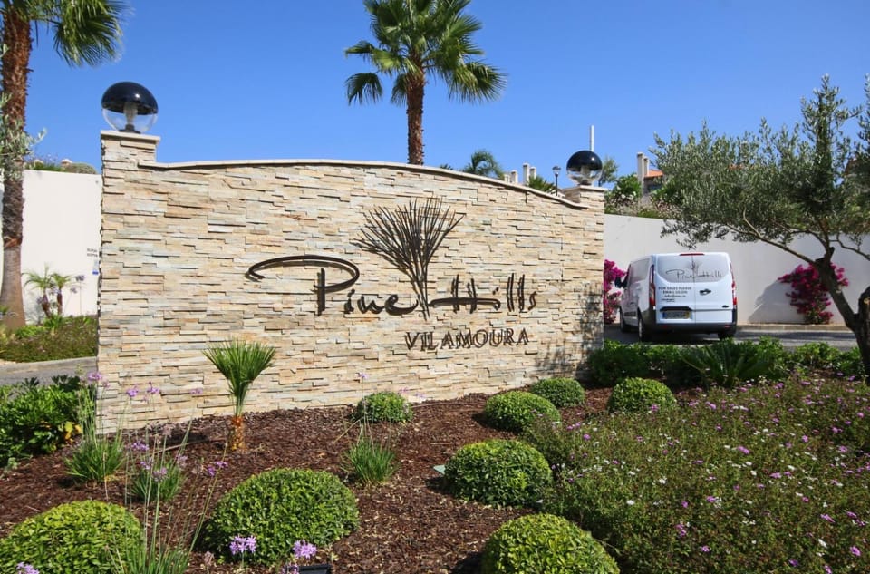 Property building, Day, Property logo or sign, Natural landscape, Street view