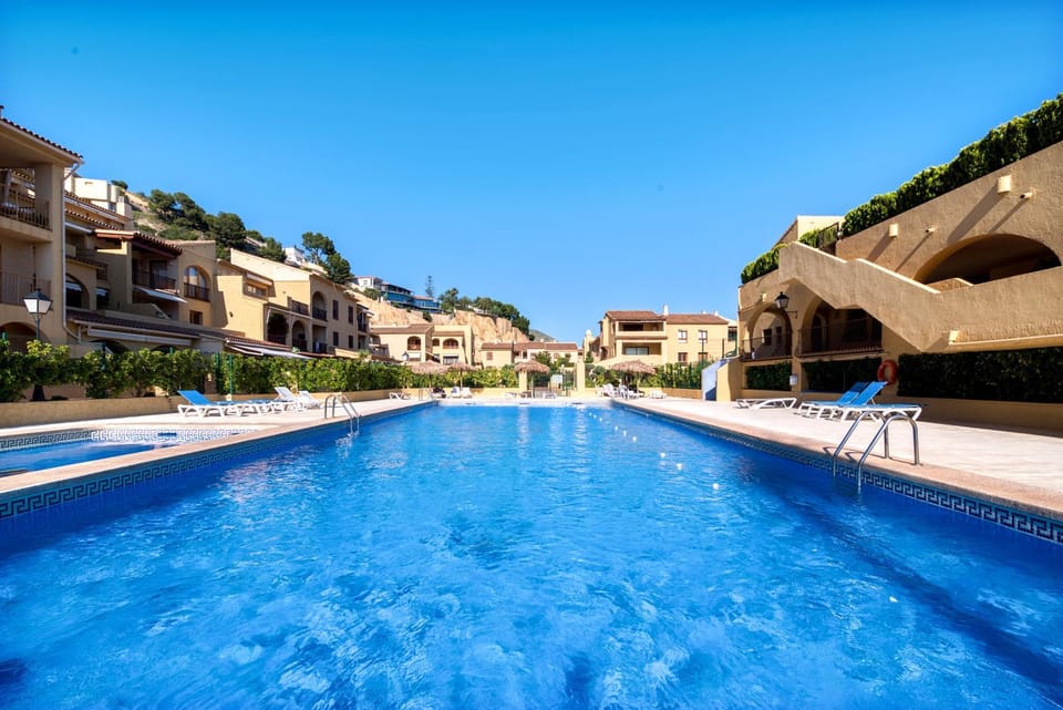 Property building, Living room, Swimming pool