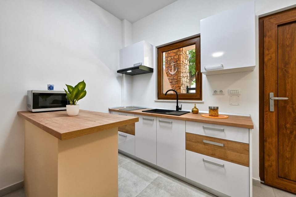 Kitchen or kitchenette, stove