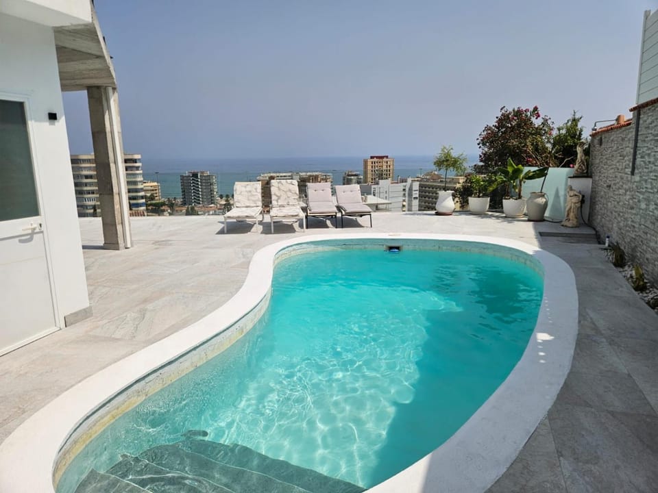 Patio, Pool view, Sea view, Swimming pool, sunbed