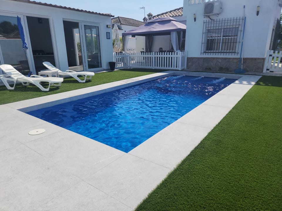 Property building, Living room, Swimming pool