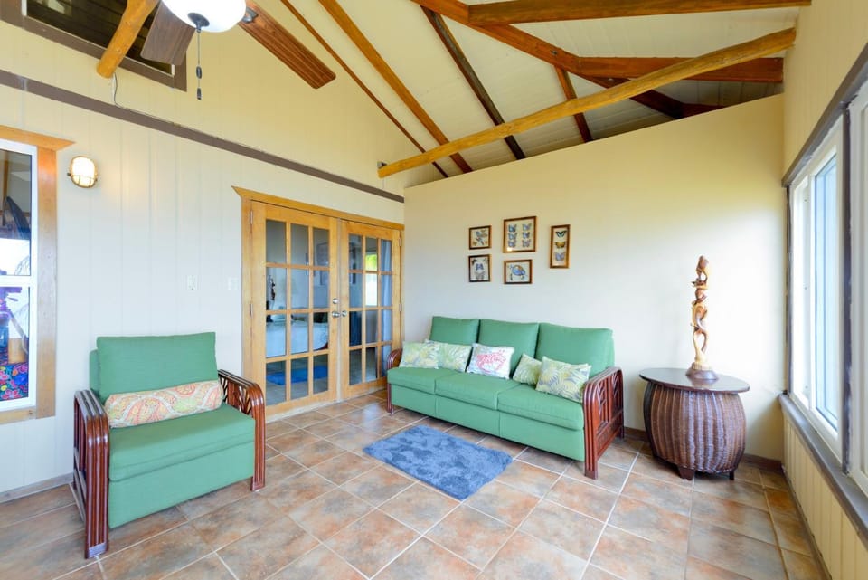 Bed, View (from property/room), View (from property/room), Living room, Seating area, Sea view, Sea view, fireplace, fireplace