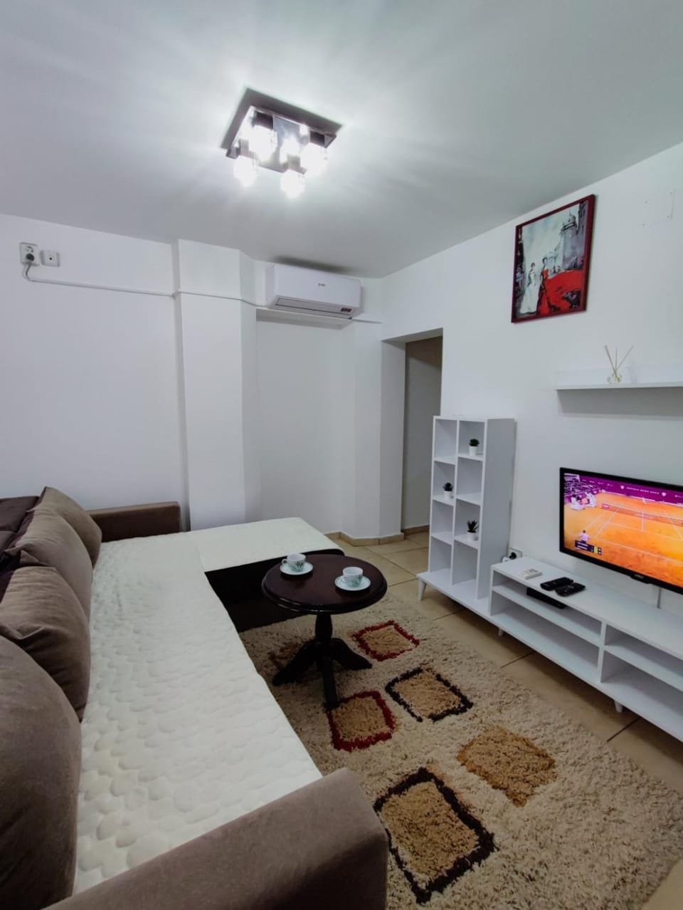 TV and multimedia, Living room, Seating area, air conditioner