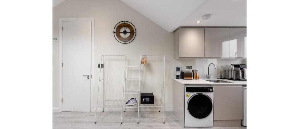 Kitchen or kitchenette, washing machine