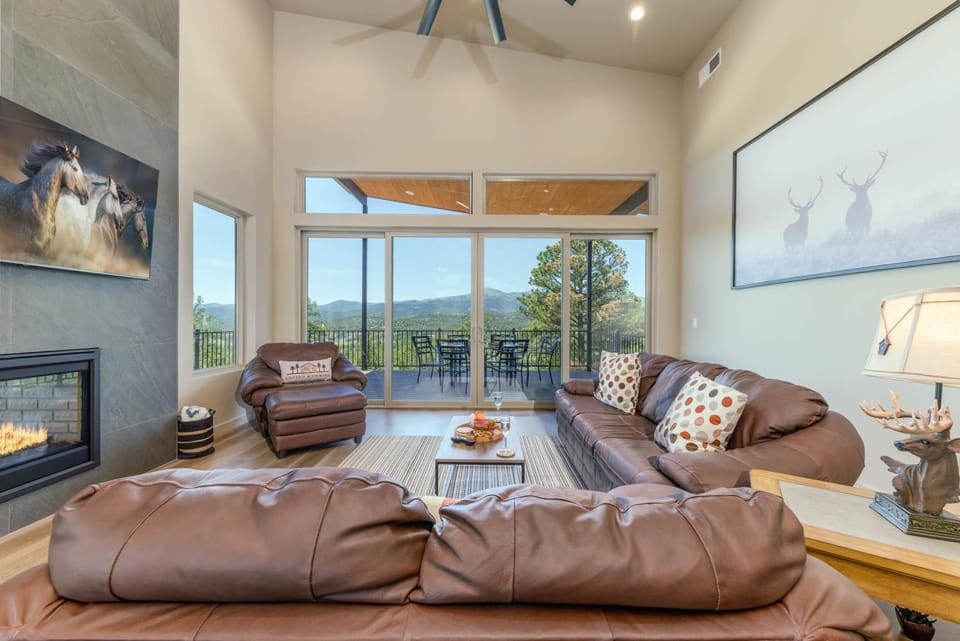 Balcony/Terrace, Living room, Seating area, Mountain view, fireplace, furniture