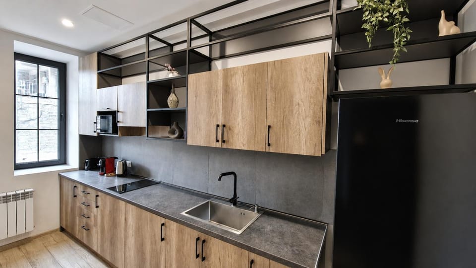 Kitchen or kitchenette, microwave, minibar, storage, storage, storage, stove, stove, toaster, toaster, toaster, washing machine, washing machine, washing machine, kitchen, kitchen