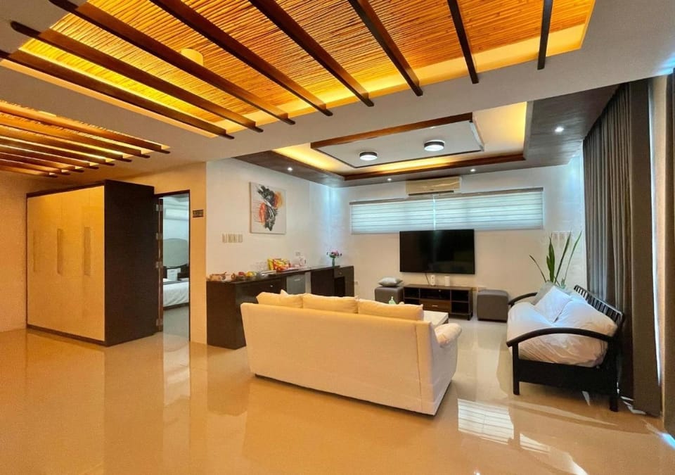 TV and multimedia, Seating area, wardrobe, air conditioner