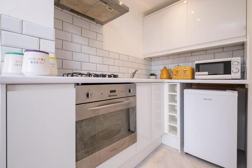 Kitchen or kitchenette, oven, stove, toaster