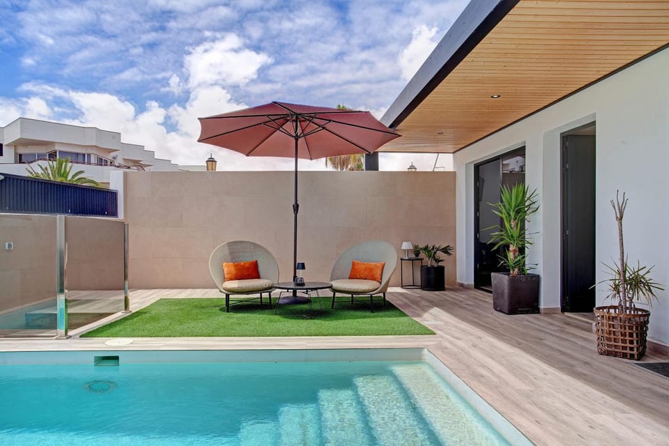 Property building, Living room, Swimming pool