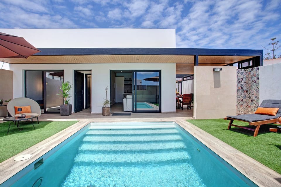 Property building, Living room, Swimming pool