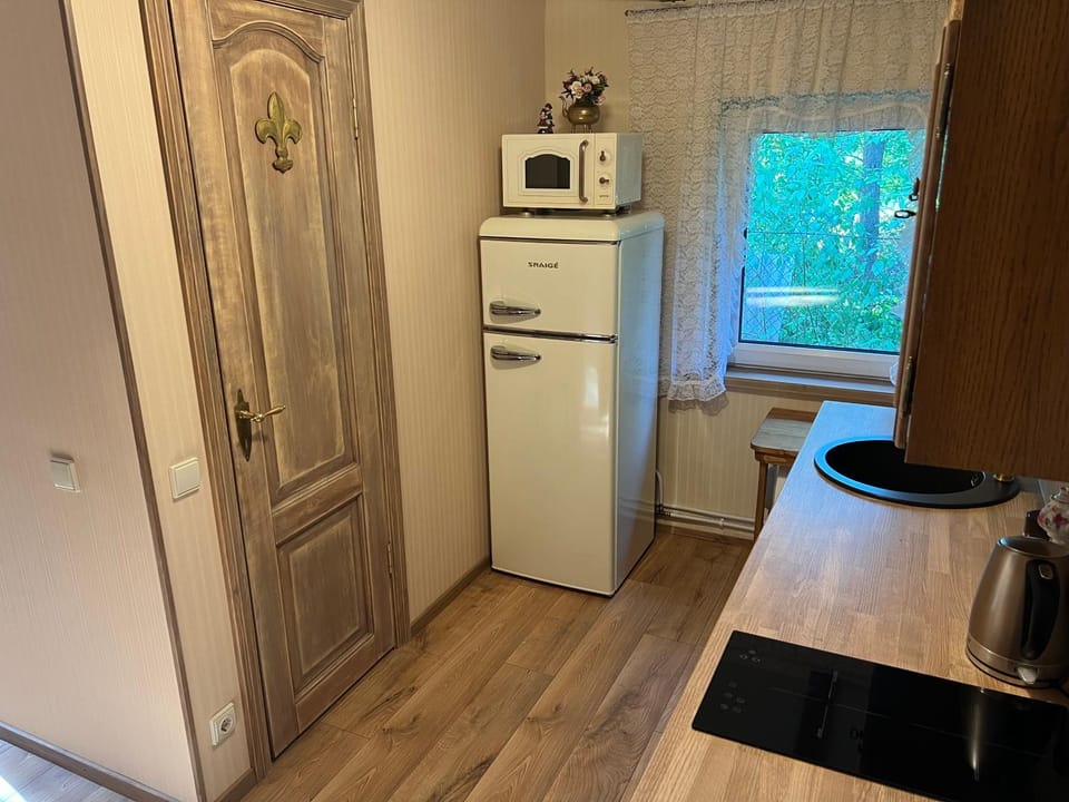 Arbatinės apartamentai - Močiutės namelis Apartment in Lithuania