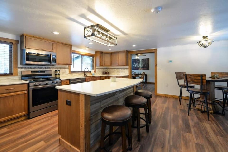 Kitchen or kitchenette, Dining area, furniture, microwave, stove