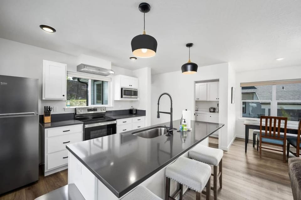 Kitchen or kitchenette, furniture, microwave, stove