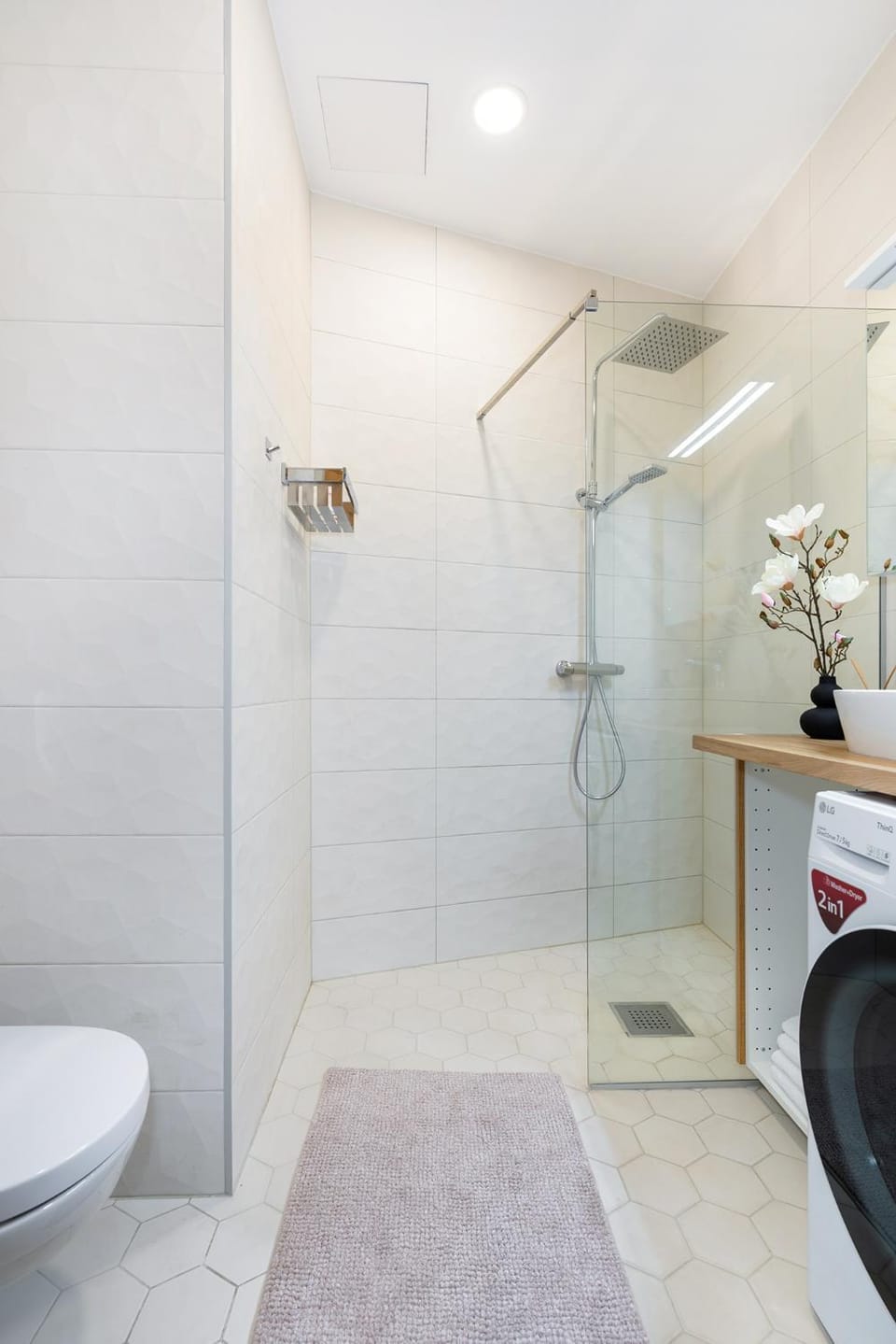Shower, Toilet, Bathroom, towels, washing machine, dryer