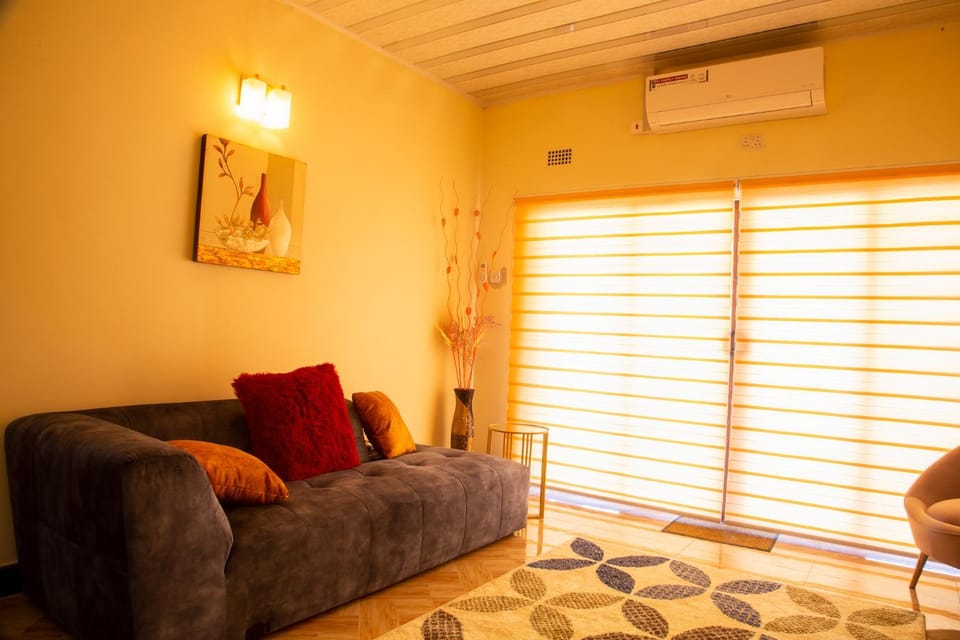 Communal lounge/ TV room, Living room, Seating area, air conditioner