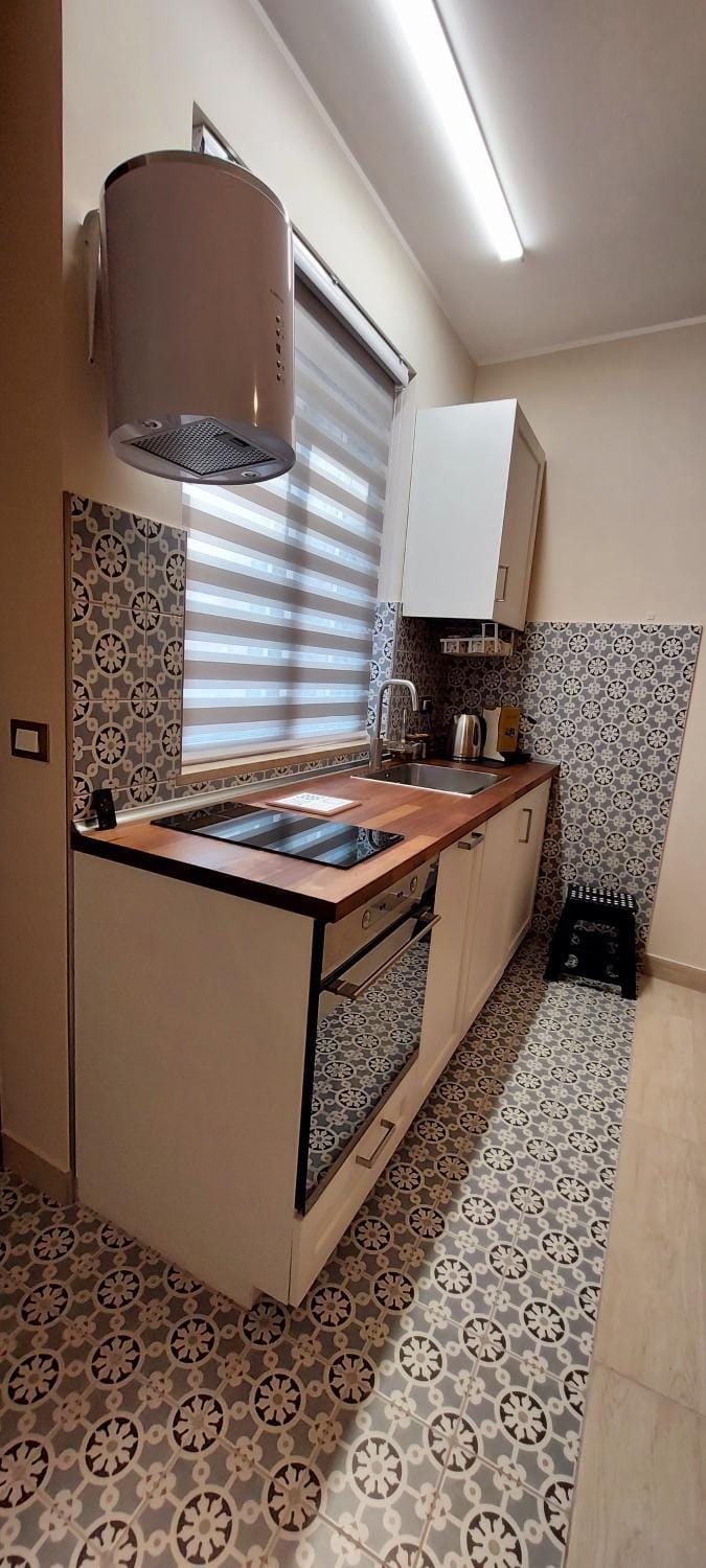 Kitchen or kitchenette, stove